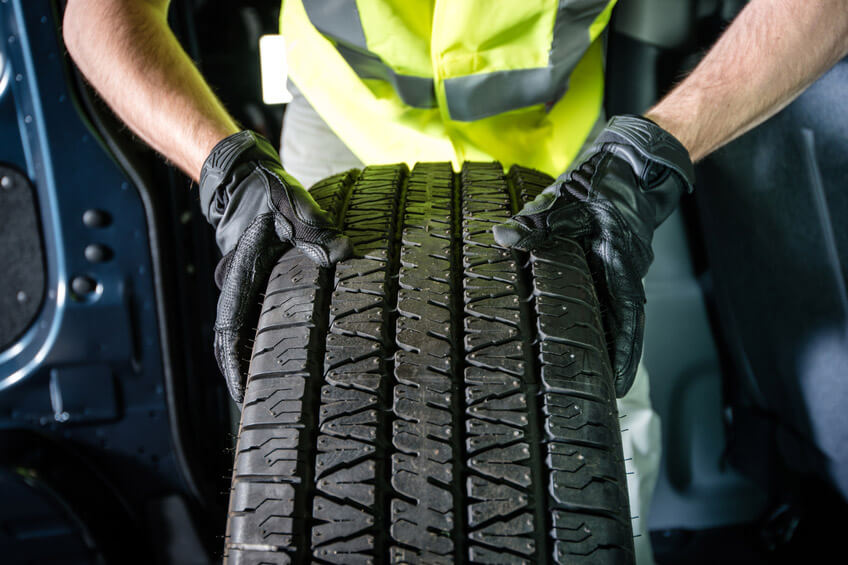 Tire fitting at Wilks Tire